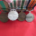 Set of 4 SADF medals with ribbons. General Service...Bronz 1994 service..Silver good service..5yr