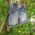 Ultra sexy denim shorts in size 30/6 by FRESH MADE. Distressed look in cotton with some stretch.