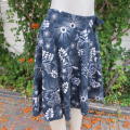 Pretty skater skrt in dark navy with white floral pattern.Yoked style waistband. Size 36/12.As new