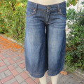 Culotte style blue denim cropped jean pants in size 34/10 by RT. Low rise. 100% cotton. As new.
