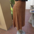 Smart A-Line calf length suede look camel skirt with seam at back and front. Zip at back.Size 42/18