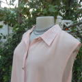 Stunning long sheer polyester peach colour top. Button down with embellished shirt collar.Size 44/20