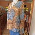 Fabulous slip over long sleeve top in brown animal print and blue lace print. Size 40/16 CASUAL CLUB