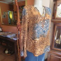 Fabulous slip over long sleeve top in brown animal print and blue lace print. Size 40/16 CASUAL CLUB