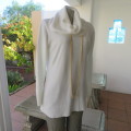 Soft cream colour long pull over cardigan with cowl neckline. In 100% acrylic yarn. Size 38 to 40