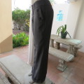 Sexy chic low rise pants in grey/black mottled polyester fabric.Size 36/12 by MASSUMI.Bootlegged.