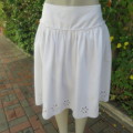 White fine cotton skirt with yoke and gathered bottom with lining, Embroidered border.Size 36/12