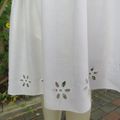 White fine cotton skirt with yoke and gathered bottom with lining, Embroidered border.Size 36/12