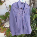 Handsome blue striped long sleeve shirt for boy of 11 yrs old in cotton. Two front pockets. As new.
