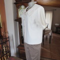 Unbleached linen cropped top with button down front and choir boy collar. Size 38/14.New condition