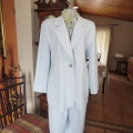 Best quality RAOUL pant suite in size 40 to 42. Pale blue colour. In 100% polyester fabric. New cond