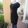 Up style black cable knit long top/short dress in size 34/10 by SEDUCTION. Capped sleeves.