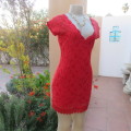 Little red lace dress with lining in size 34/10.Scoloped V neckline.Tiny sleeves. Mini length.As new