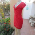 Little red lace dress with lining in size 34/10.Scoloped V neckline.Tiny sleeves. Mini length.As new