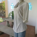 Easy to wear cream slip over elbow length top in stretch polycotton. Size 38/14 by `Real` clothing.