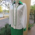 As new long sleeve soft 100% cotton shirt with green and black shirt collar and cuffs. Size 38/14