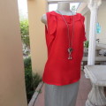 Pretty bright red sleeveless top with stretch viscose back and polyester front size 40/16. As new.