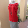 Pretty bright red sleeveless top with stretch viscose back and polyester front size 40/16. As new.