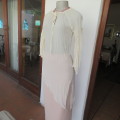 Pretty long permanent creased high-low cream top with long angel point sleeves size 32/8. As new.