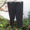 Smart black 100% polyester pants by 'Donna- Claire' in size 46/22. Straight legs. As new.