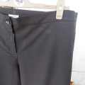 Smart black 100% polyester pants by 'Donna- Claire' in size 46/22. Straight legs. As new.