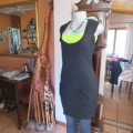 Knitted black long top/dress.Low  U neckline.Sleeveless size 34/10 by `RT`.Two cute pockets.As new!