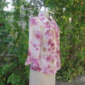 Beautiful top in cream colour with floral patterns in shades of pinks. Size 36/12 by 'Massumi'.