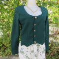 Hunters green cropped crimplene button down top with long sleeves. V neckline size 34/10.