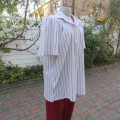 Casual short sleeve owner made shirt in white with red + blue stripes size 42/18. New condition.