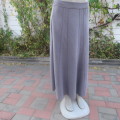 Elegant paneled A line skirt in ecru  with silver  thread embroidery on front. Size 42/18. As new