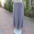 Elegant paneled A line skirt in ecru  with silver  thread embroidery on front. Size 42/18. As new