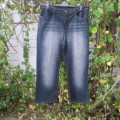 Fashion blue denim jeans in size 42/18.In stretch polyester fabric. Straight legs. As new.