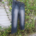 Fashion blue denim jeans in size 42/18.In stretch polyester fabric. Straight legs. As new.