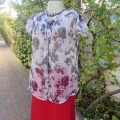 Sweet silver grey sheer polyester summer top with darker grey flowers. Size 36/12 by FASHION EXPRESS