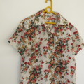 Cute short sleeve floral button down top with shirt collar for girl 7 to 8 years old. As new