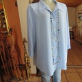 Smart skyblue size 46/22 button down top with elbow length sleeves. Open collar by WHISPER. As new.