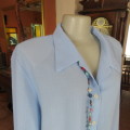 Smart skyblue size 46/22 button down top with elbow length sleeves. Open collar by WHISPER. As new.