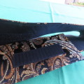 Amazing black with gold,beige and light brown paisley pattern with shine. From size 36/40. As new.
