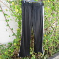 Men's black tracksuite pants with two silver stripes at sides. Size XL by IMAGE. Good condition.