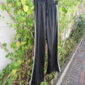Men's black tracksuite pants with two silver stripes at sides. Size XL by IMAGE. Good condition.