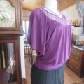 Must have short purple blouson style top in polyester/rayon stretch. Size 34/10 by RT. As new.