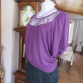 Must have short purple blouson style top in polyester/rayon stretch. Size 34/10 by RT. As new.