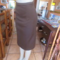 Elegant 80`s choc. brown paneled skirt in jersey size 32 by JENNY- LYNN.Calf length. As new