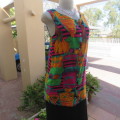 Cheerful long sleeveless button down top made by owner in viscose fabric. Size 32/8.Good cond.