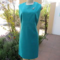 Vintage dress in empire style size 40/16 by MYRU MODELS. Jade colour with silver embroidery.