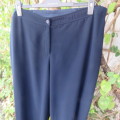 Smart navy DONNA CLAIRE pants in 100% polyester. Size 44/20. Tapered legs. Good condition.