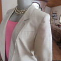 Top of the line short sleeve beige textured linen/cotton jacket in size 34/10 by ESSENCE.As new