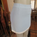 Stunning fully lined baby blue mini skirt with white seam in size 30/6. Pencil style. New condition