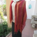 Stunning must have scarf In dark but lively autumn colours. Woven polyester. 180cm x 70cm. As new.