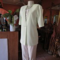 Light mint green short sleeve jacket/cover-up low V-front. Size 34/10 by SOFT BLOUSE. New condition.